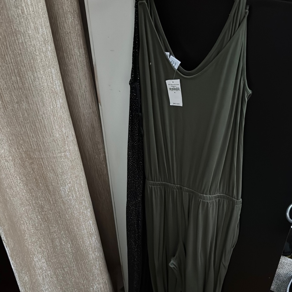 Two GAP rompers green one black and white